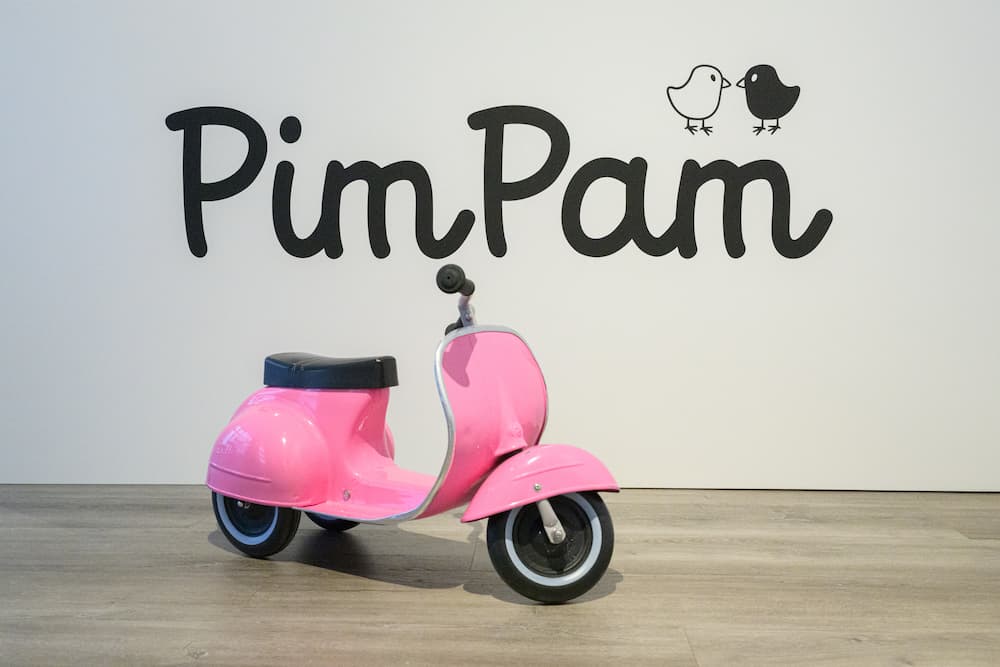 PimPam indoor playground, pink vespa in front of pimpam logo